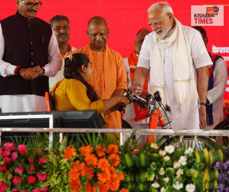 PM Narendra Modi addressing crowd in Varanasi amid heavy rain Inauguration ceremony of ₹2,200 crore development projects by PM Modi in Varanasi Prime Minister handing over welfare equipment to divyangjan in Varanasi