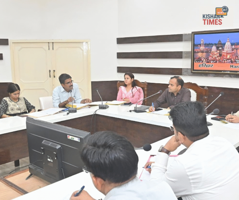 DM Mayur Dikshit chairing the district-level meeting on women and child welfare in Haridwar Officials discussing child protection and welfare policies in Haridwar review meeting